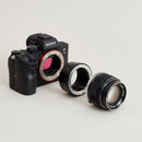 Urth Lens Mount Adapter: Compatible with Olympus OM Lens to Sony E Camera Body